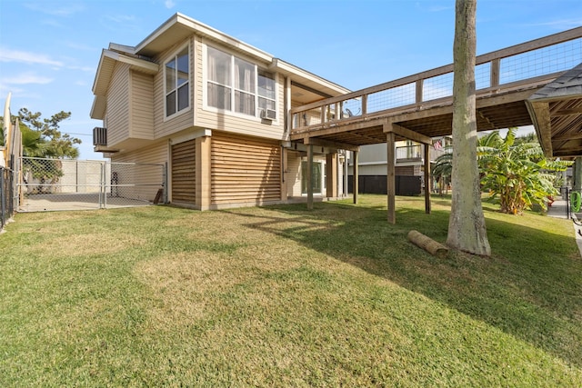 back of house with central AC, a deck, and a lawn