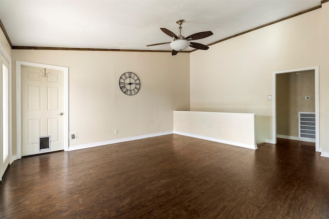 unfurnished room featuring ceiling fan, dark wood-type flooring, lofted ceiling, and ornamental molding