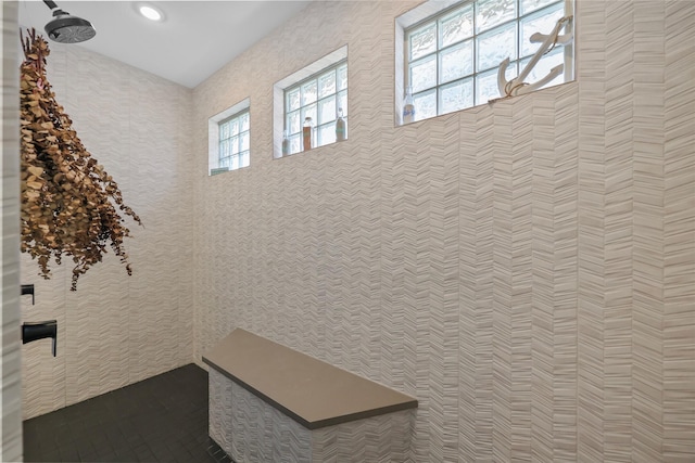 bathroom with tiled shower