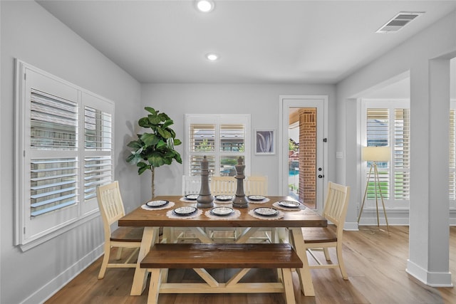 dining area featuring hardwood / wood-style flooring