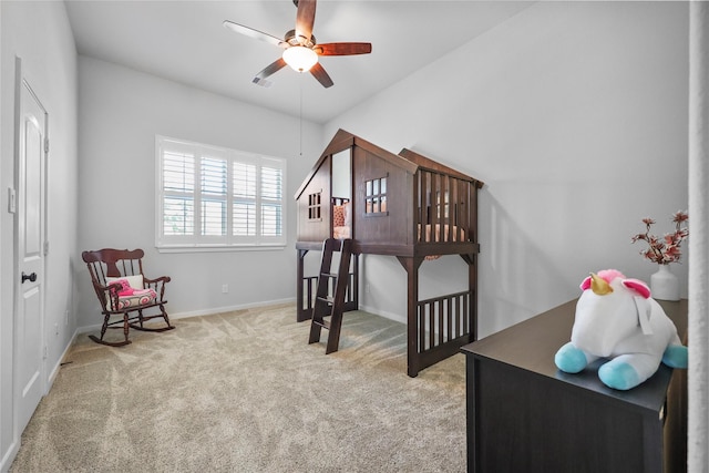 carpeted bedroom with ceiling fan