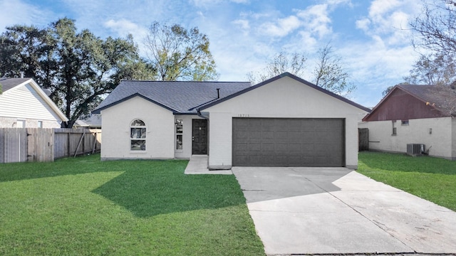 ranch-style house with a front yard, a garage, and central AC unit