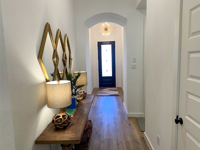 entryway with hardwood / wood-style flooring