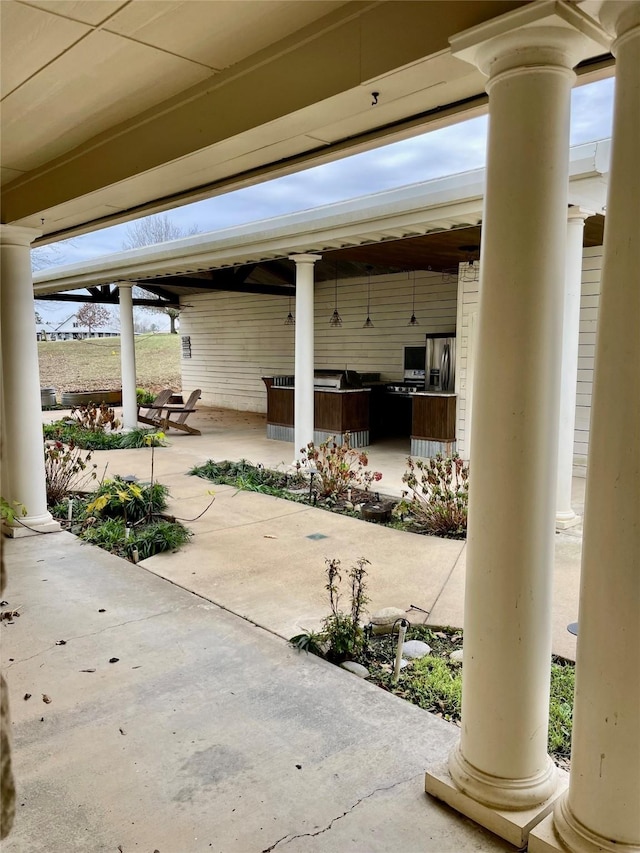 view of patio with area for grilling