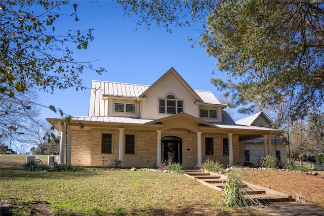 view of front facade featuring a front yard