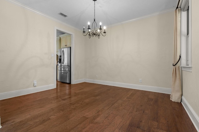 235 Fm 3313, Crockett, TX 75835 - unfurnished dining area featuring a chandelier, dark wood-style flooring, and ornamental molding
