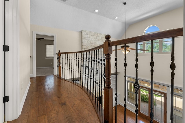 235 Fm 3313, Crockett, TX 75835 - hallway featuring a textured ceiling, vaulted ceiling, wood finished floors, and recessed lighting
