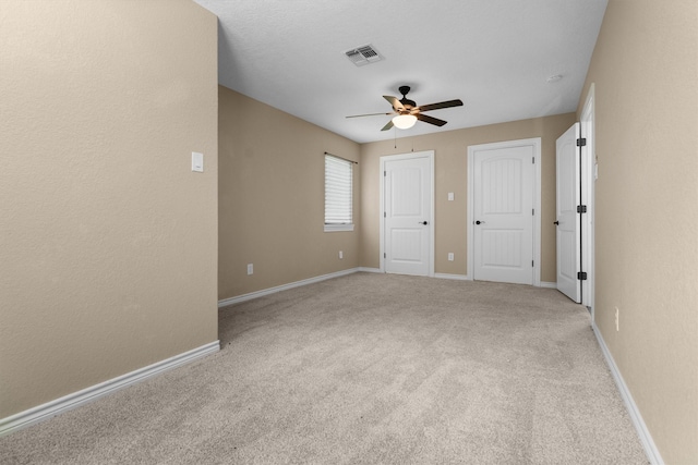235 Fm 3313, Crockett, TX 75835 - unfurnished bedroom with carpet flooring and ceiling fan