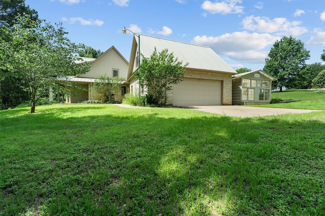 235 Fm 3313, Crockett, TX 75835 - view of front facade with a garage, driveway, a front lawn, a metal roof, and stone siding