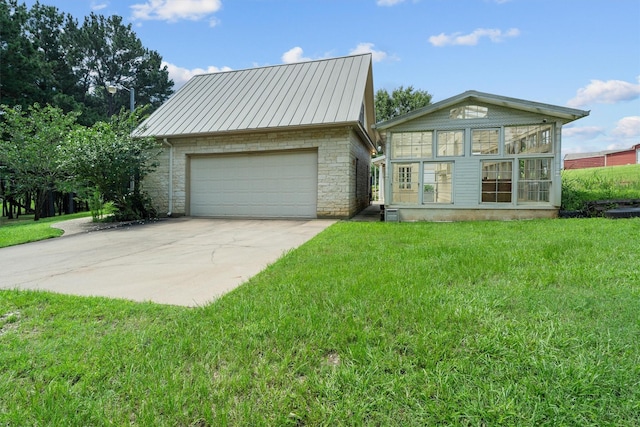 235 Fm 3313, Crockett, TX 75835 - view of front of property with a garage, an outbuilding, a front yard, and stone siding