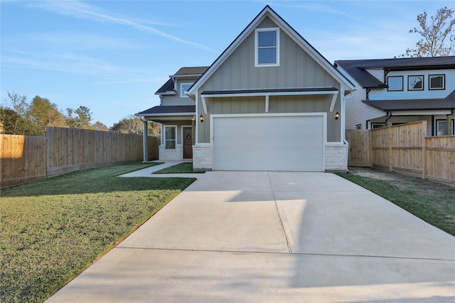 view of front facade featuring a front lawn and a garage