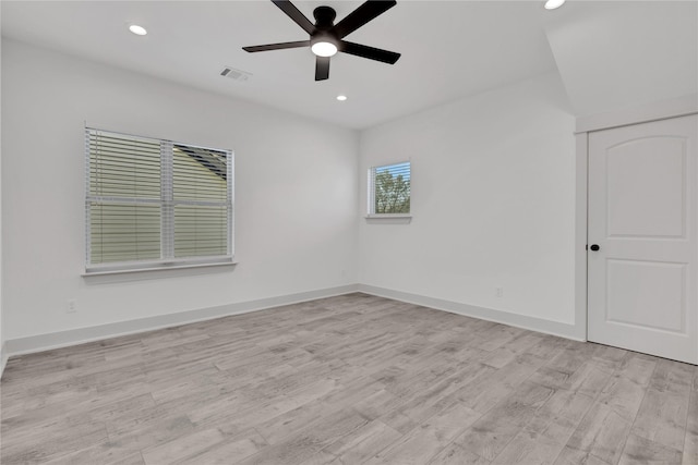 spare room featuring ceiling fan and light hardwood / wood-style floors