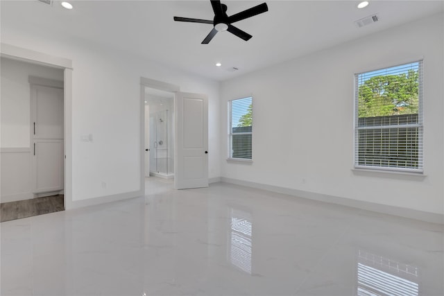 unfurnished bedroom featuring ceiling fan