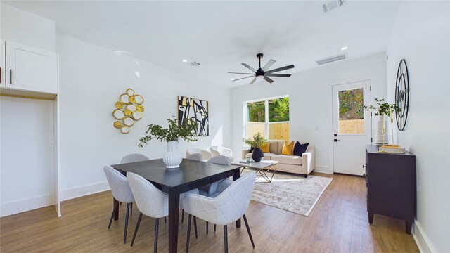 dining room featuring hardwood / wood-style floors and ceiling fan