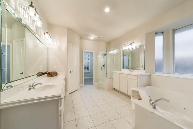 bathroom featuring tile patterned floors, vanity, and plus walk in shower