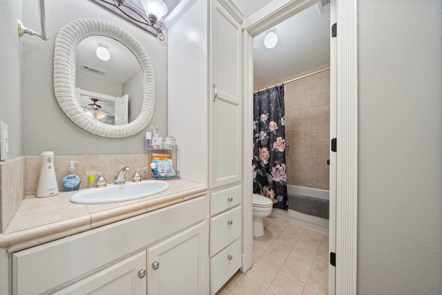 full bathroom with tile patterned flooring, backsplash, vanity, shower / bath combination with curtain, and toilet