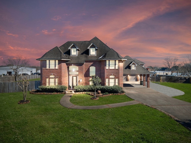 view of front of home with a yard