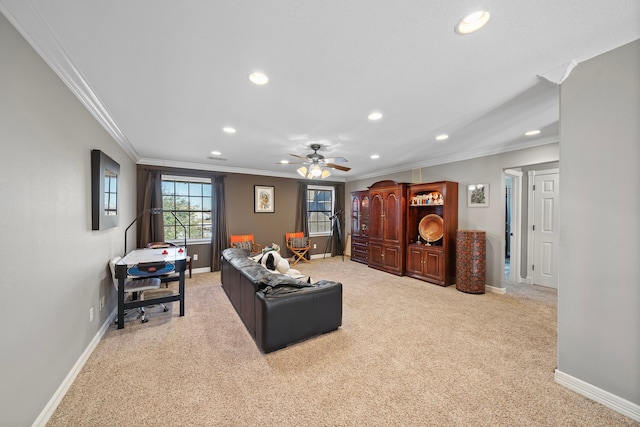 carpeted living room featuring crown molding and ceiling fan