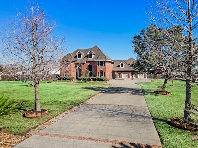 view of front facade featuring a garage and a front yard