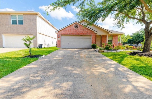 view of front facade with a front yard and a garage