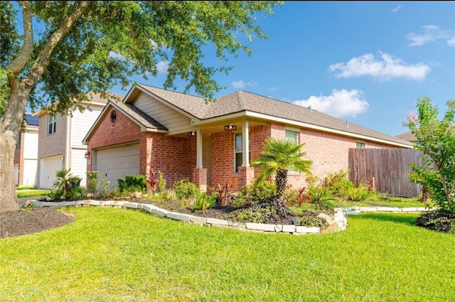 ranch-style house featuring a front lawn and a garage