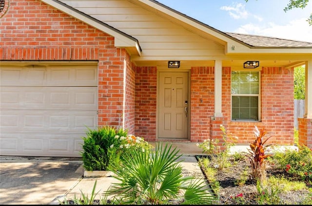 property entrance with a garage