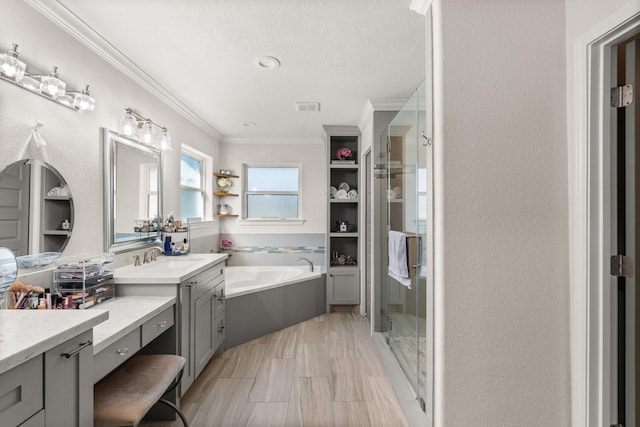 bathroom with vanity, independent shower and bath, a textured ceiling, and ornamental molding