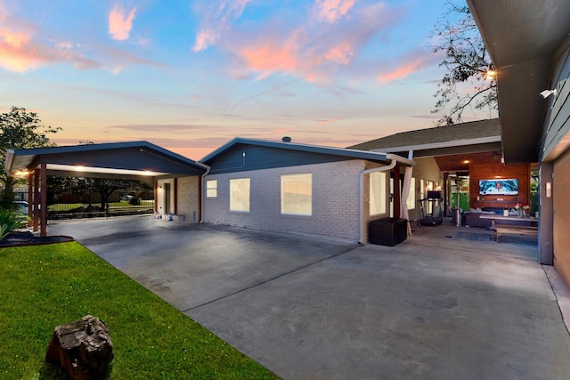 view of front of home with a carport