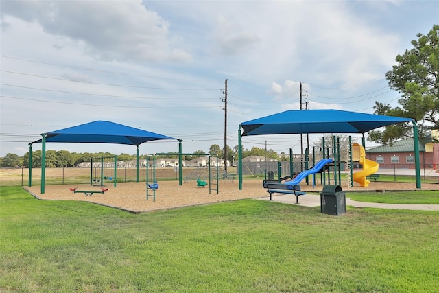 view of jungle gym featuring a lawn