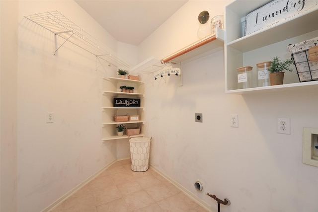 laundry area featuring hookup for a washing machine, gas dryer hookup, and hookup for an electric dryer