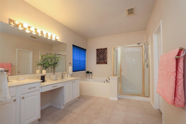 bathroom featuring vanity and separate shower and tub