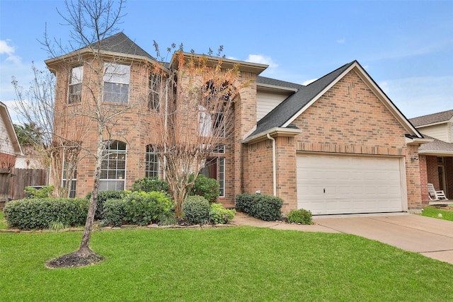 view of front of home with a garage and a front lawn