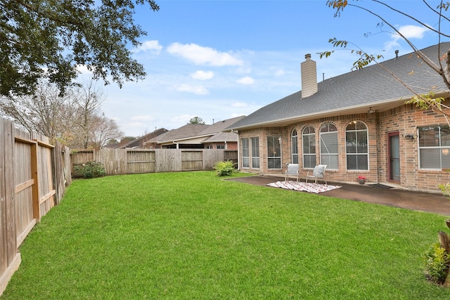 view of yard featuring a patio area