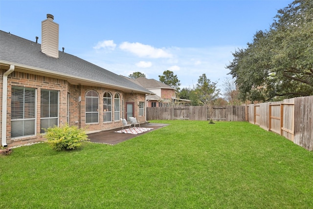 view of yard with a patio area