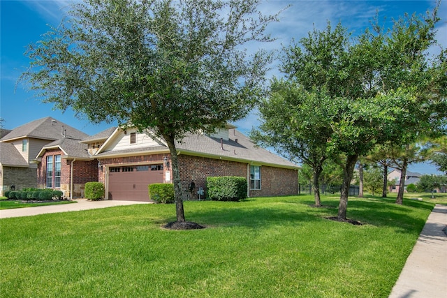 view of front of house with a front lawn and a garage