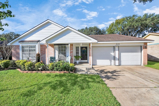 single story home with a garage and a front yard