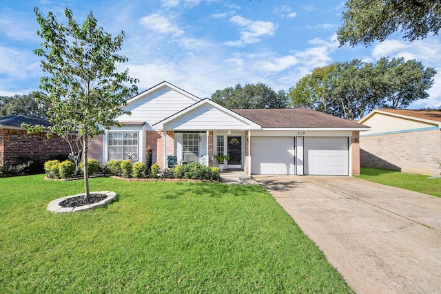 single story home featuring a front lawn and a garage