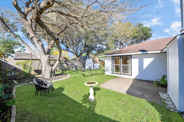 view of yard with a patio and a fire pit