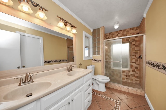 bathroom featuring tile patterned floors, toilet, a shower with door, and ornamental molding