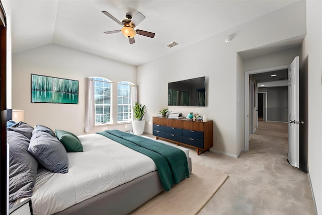 carpeted bedroom with ceiling fan and lofted ceiling