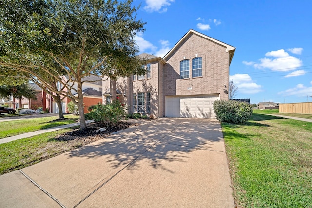 front of property with a garage and a front lawn