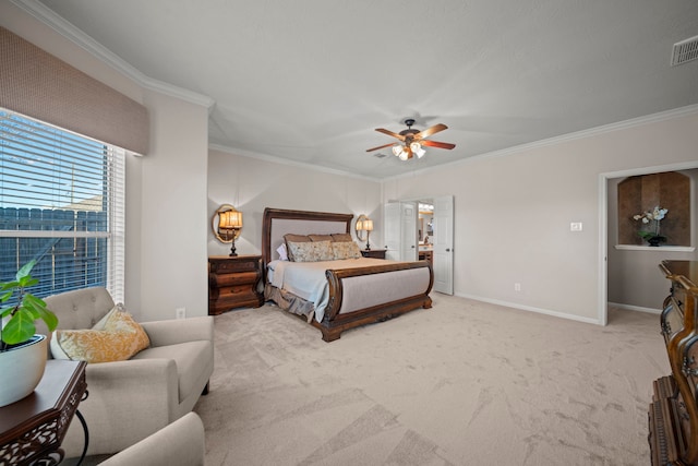 bedroom with ceiling fan, crown molding, and carpet floors