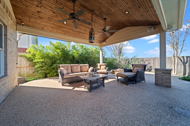 view of patio featuring outdoor lounge area and ceiling fan