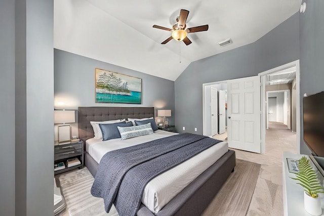 bedroom featuring ceiling fan and vaulted ceiling