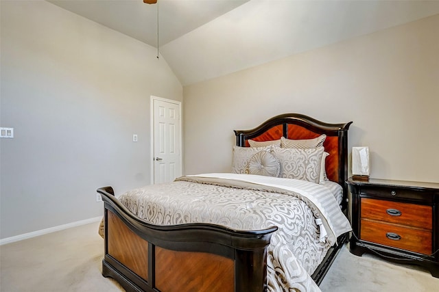 carpeted bedroom featuring vaulted ceiling