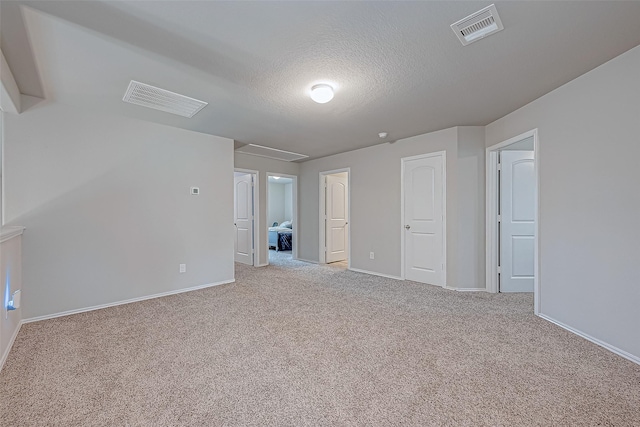 interior space with a textured ceiling