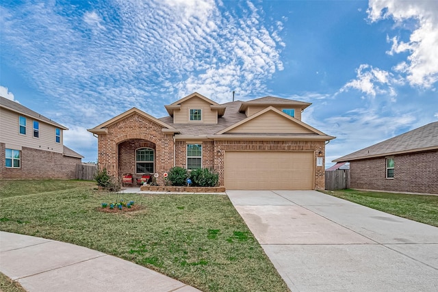 view of front of home featuring a garage and a front yard