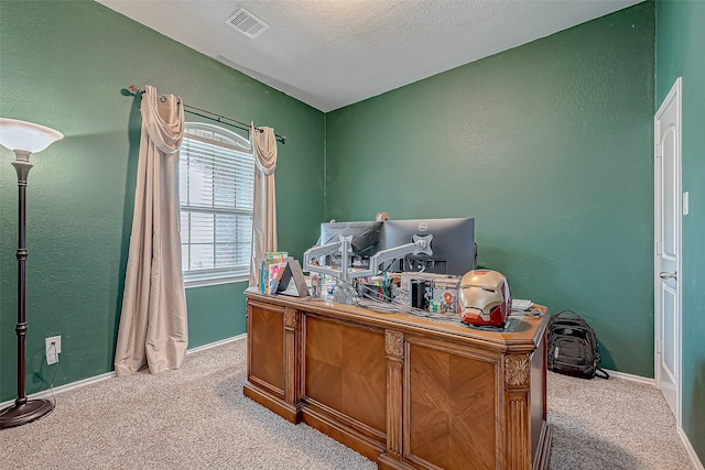 carpeted bedroom featuring a textured ceiling