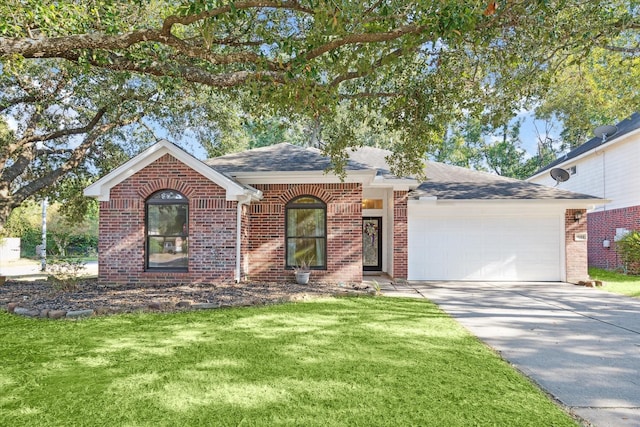 ranch-style house with a garage and a front lawn