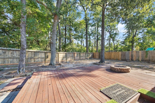 deck featuring a fire pit